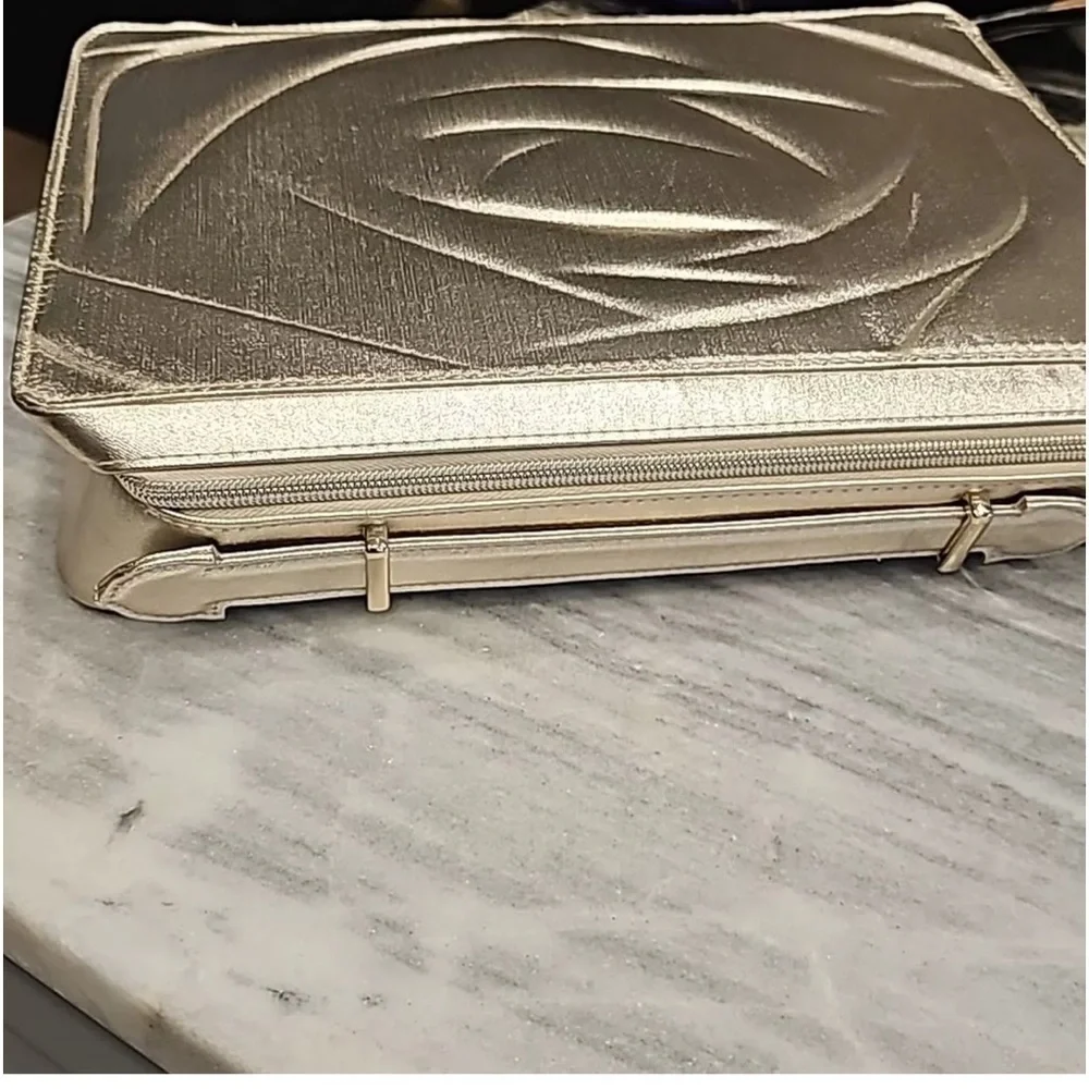 Lancôme   travel cosmetic gold bag